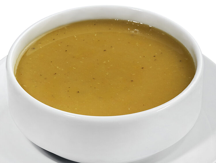 lentil soup, cream soup of yellow lentils, isolated on white