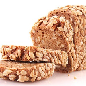 Bread with sunflower seeds isolated on white
